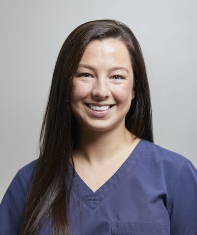 Kristin smiling because she enjoys being part of our Woburn dental team